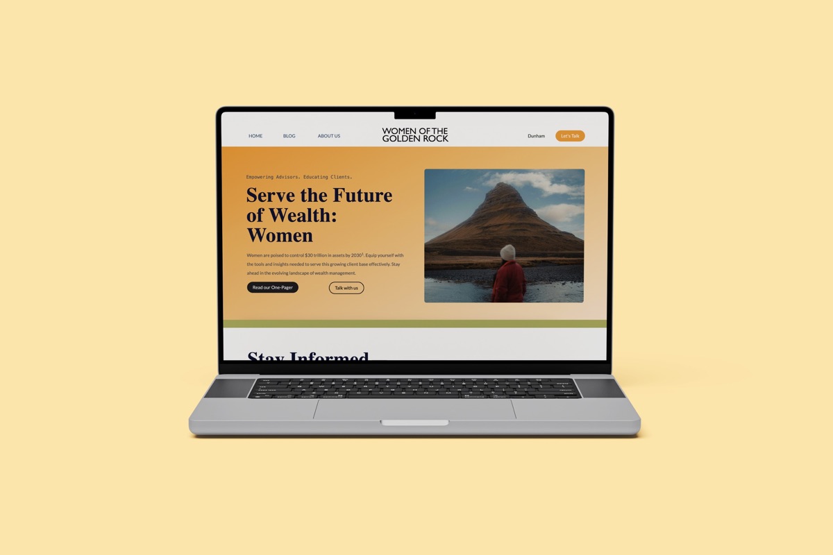 Women of the Golden Rock website home page on a laptop